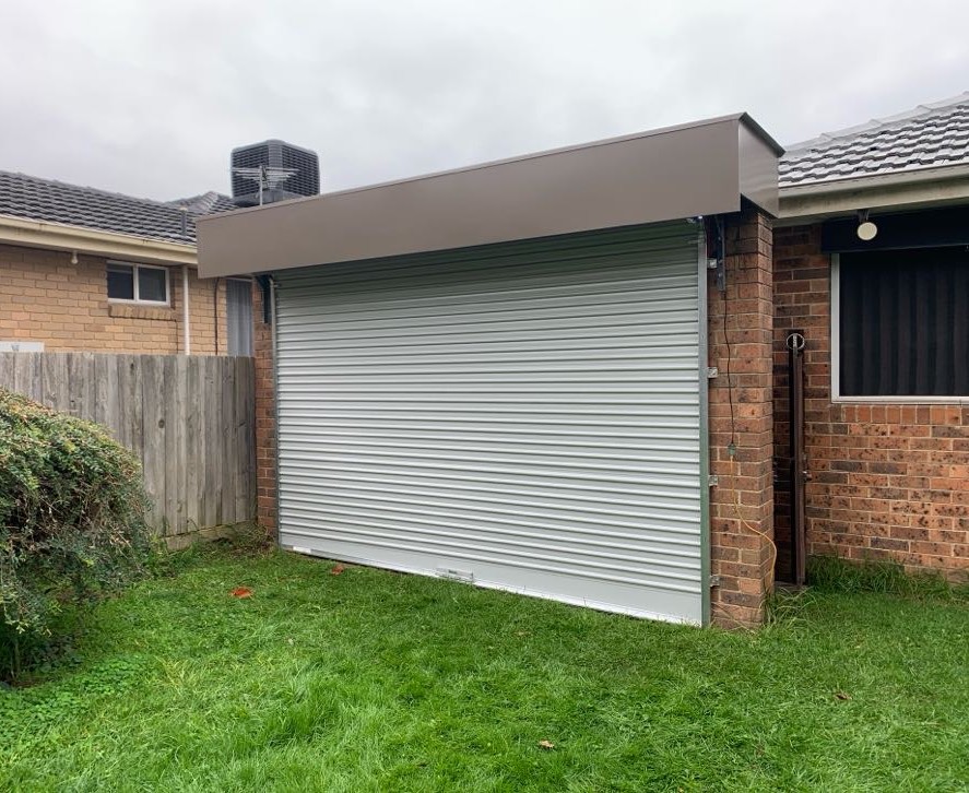 Taurean Roller Door - Reverse Roll, Colorbond Jasper with Taper