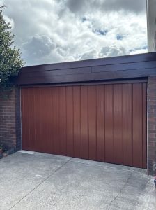 Custom Made J Fitting Tilt Door, Vertical Clad A Panel, Powder Coated to Match Discontinued Colorbond Colour Terrain