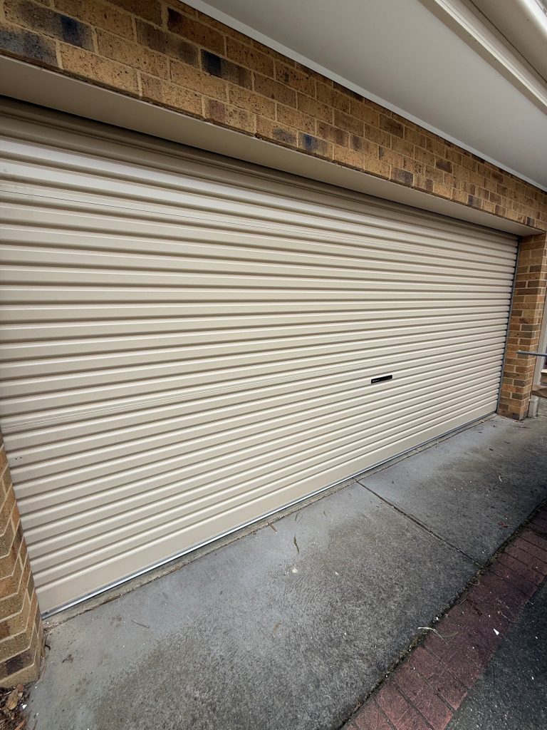 B&D Roll-A-Door, Colorbond Paperbark, with Lock Plate