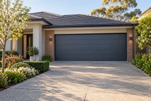 Well-presented Melbourne home with a closed garage door in spring